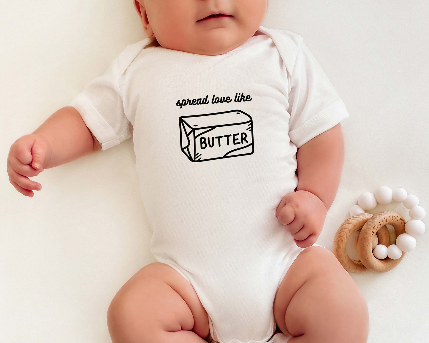 Spread Love Like Butter Baby Bodysuit