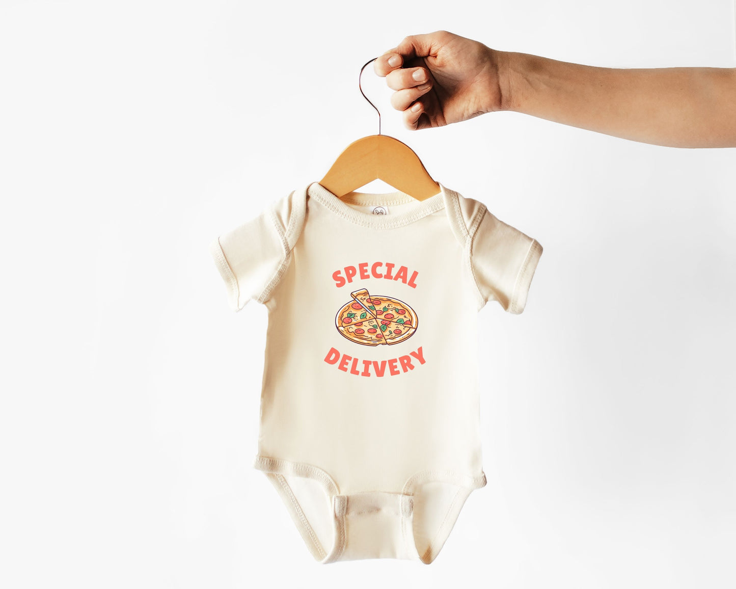Short sleeve cotton baby onesie with a pizza graphic and the text Special Delivery