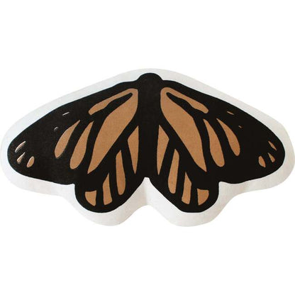 Butterfly wing-shaped canvas pillow on a white background