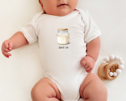 Baby wearing a short sleeve cotton baby onesie with a sourdough starter jar graphic and the text "feed us".